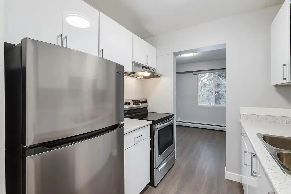 Gym, indoor swimming pool, social room and more! | Comfortable living overlooking the Glenmore Reservoir!