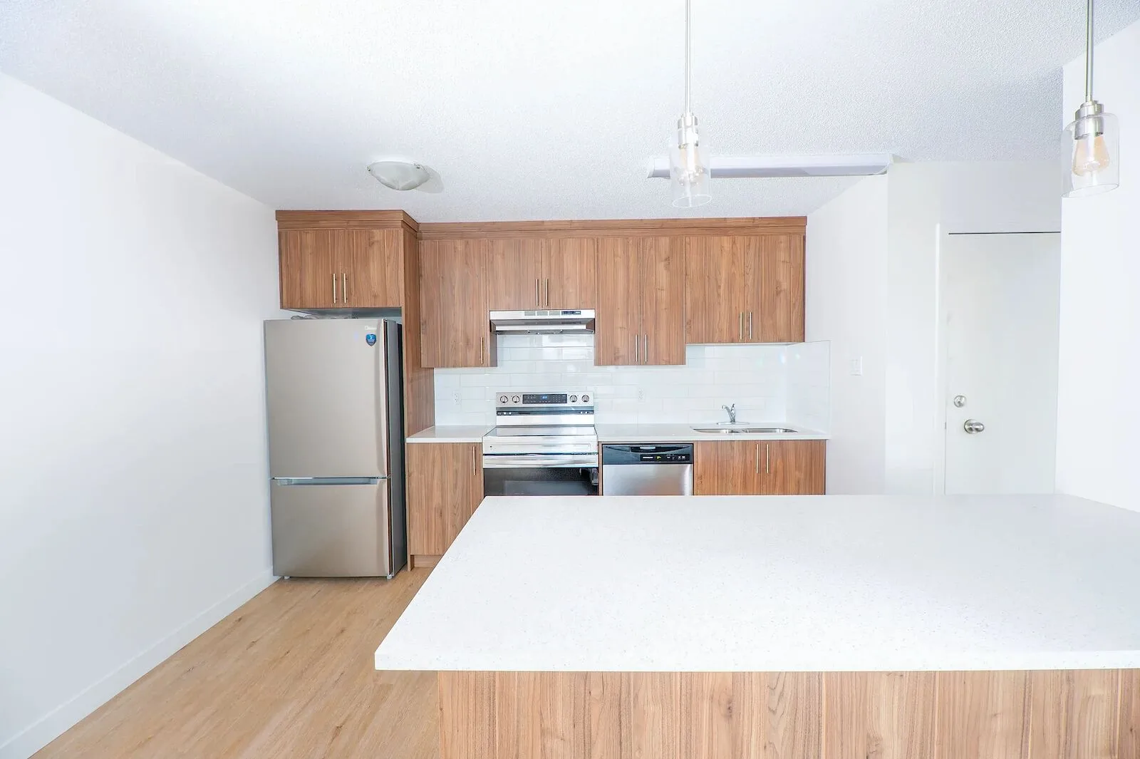 Discover elevated living at The Wellington | Steps away from popular shops and restaurants on 17th Ave!