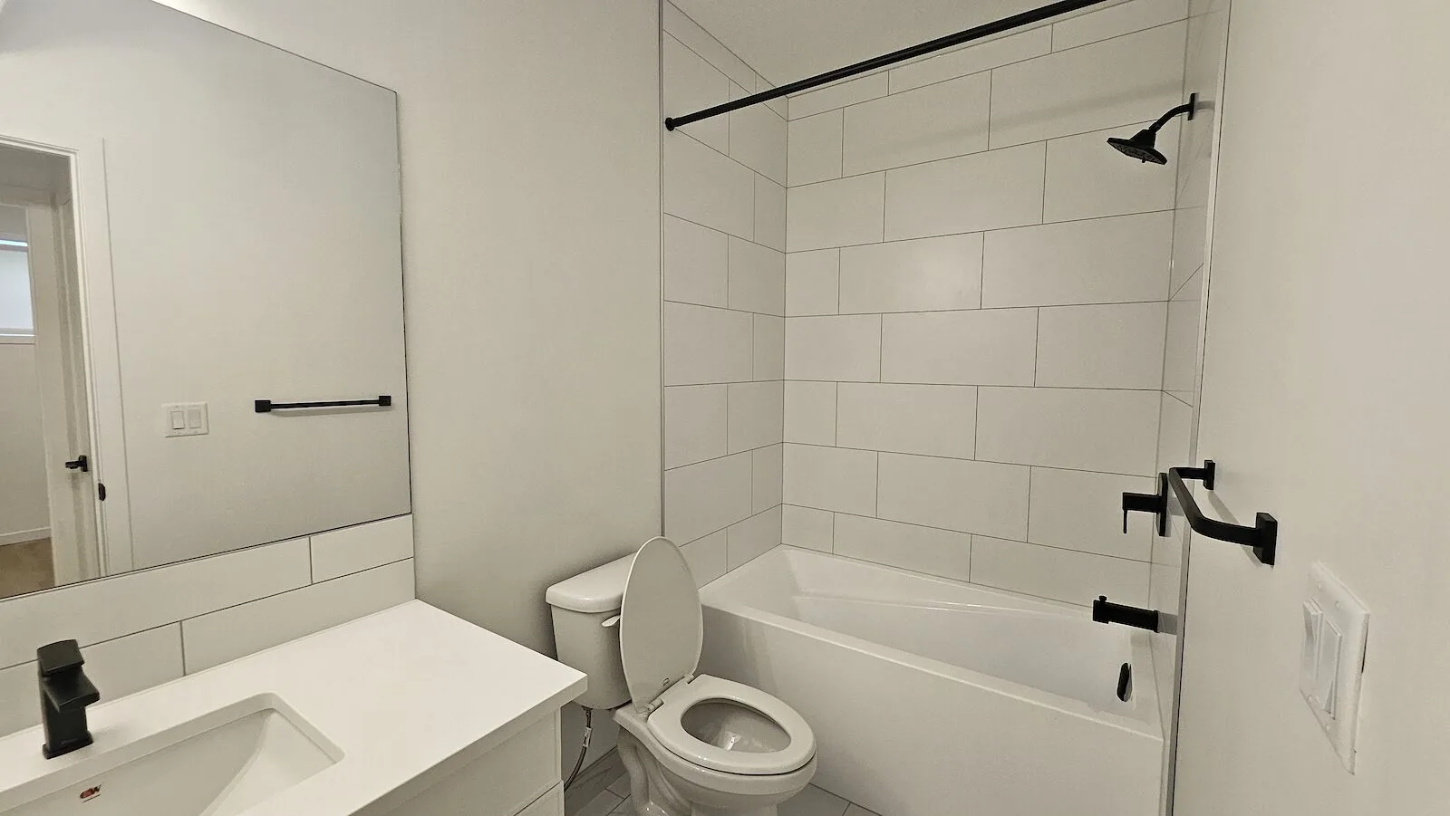 Affordable Modern 1-Bed Basement Suite with Garage Parking!