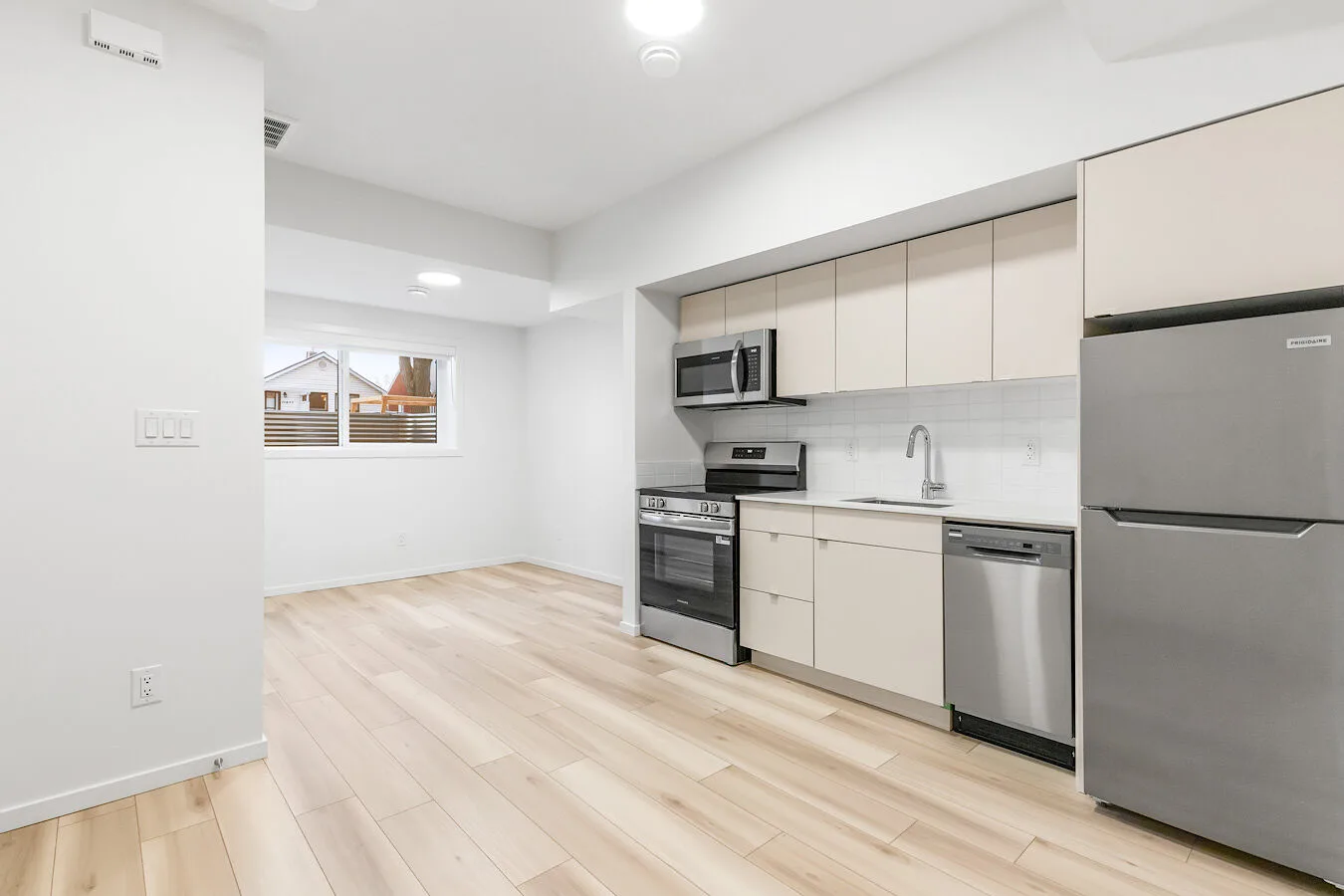 Upscale Bright South-Facing Unit with Premium Finishes & In-Suite Laundry!