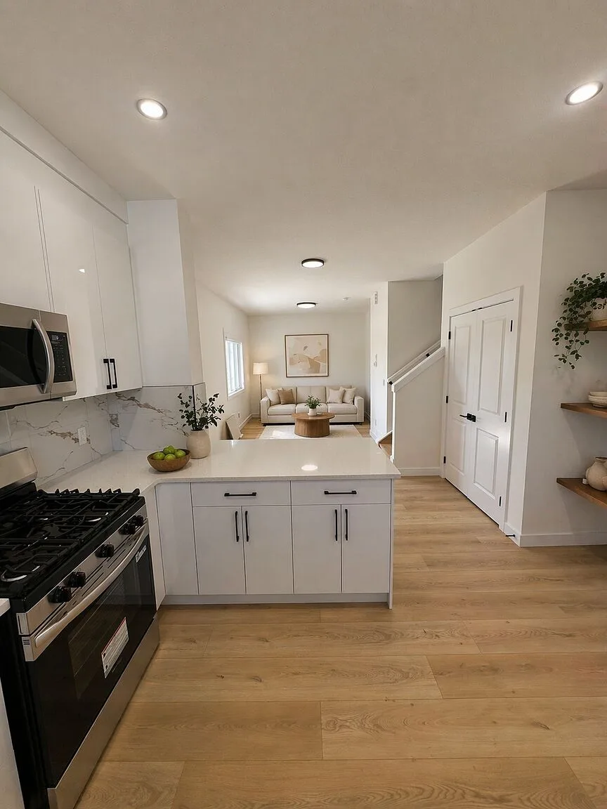 Britannia Youngstown — Brand-new 3-bed / 2.5-bath townhomes and finished 1-bed / 1-bath legal basement suites at 15906